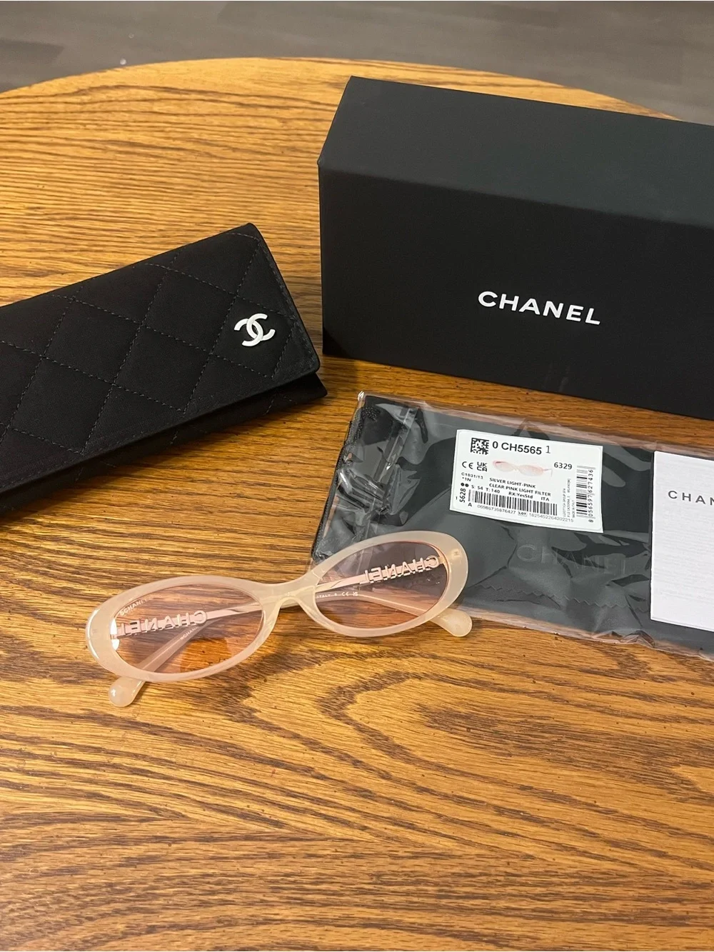 CHANEL Translucent Pale Pink Oval Sunglasses